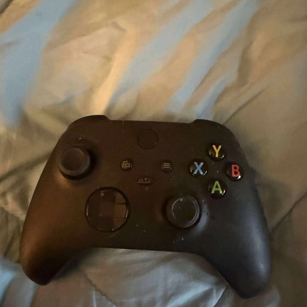 Sleek Black Wireless Gaming Controller